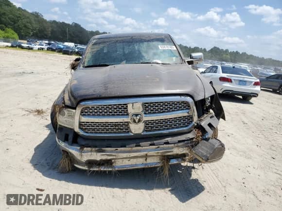 2018 Ram 1500 Laramie с VIN 1C6RR7NMXJS254541, выставлен на аукционе Copart как лот 65878185 с пробегом 194 011 миль миль и Списание • Salvage title. История ставок и продаж доступна на DreamBid. Изображение 5.