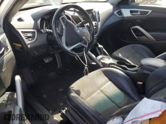 2014 Hyundai Veloster с VIN KMHTC6AD9EU217468, выставлен на аукционе Copart как лот 71742305 с пробегом 141 759 миль миль и Списание • Salvage title. История ставок и продаж доступна на DreamBid. Изображение 8.