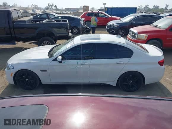 2016 BMW 5 Series 535i with VIN WBA5B1C54GG554086, listed as a IAAI auction lot 42910383 with 107,203 mi miles and . Bid and sale history available at DreamBid. Image 14.