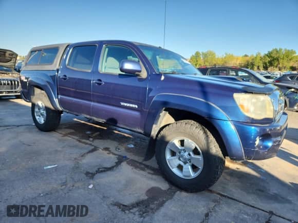 2008 Toyota Tacoma with VIN 3TMLU42N08M014815, listed as a Copart auction lot 81335105 with 317,218 mi miles and Salvage title. Bid and sale history available at DreamBid. Image 4.