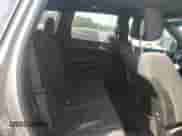 2014 Jeep Grand Cherokee Laredo with VIN 1C4RJEAGXEC573989, listed as a Copart auction lot 67977075 with 141,134 mi miles and Salvage title. Bid and sale history available at DreamBid. Image 11.