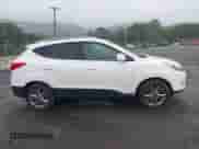 2014 Hyundai Tucson Limited with VIN KM8JU3AG7EU796103, listed as a IAAI auction lot 43026406 with 190,377 mi miles and . Bid and sale history available at DreamBid. Image 13.