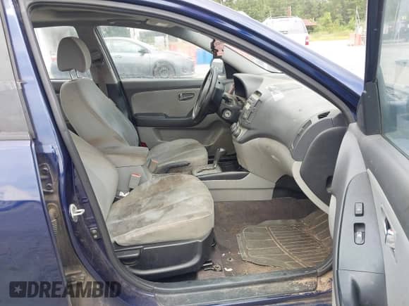 2010 Hyundai Elantra Blue with VIN KMHDU4ADXAU184528, listed as a IAAI auction lot 43211546 with 220,504 mi miles and . Bid and sale history available at DreamBid. Image 5.