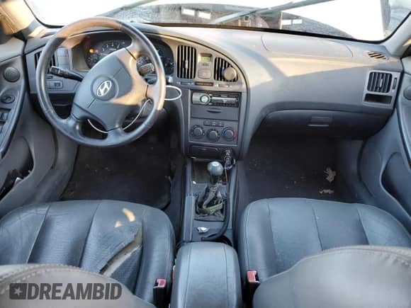 2004 Hyundai Elantra GT z VIN KMHDN56D64U107770, wystawiony jako Copart lot #84436064 z przebiegiem 285 779 mil mil oraz Szkoda całkowita • Salvage title. Historia ofert i sprzedaży dostępna na DreamBid. Obrazek 8.