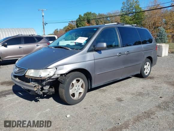 2000 Honda Odyssey EX with VIN 2HKRL1868YH542409, listed as a IAAI auction lot 43406964 with 215,253 mi miles and . Bid and sale history available at DreamBid. Image 2.