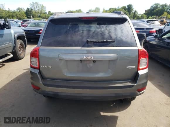 2011 Jeep Compass z VIN 1J4NF1FB9BD277187, wystawiony jako Copart lot #69288125 z przebiegiem 110 932 mil mil oraz Szkoda całkowita • Salvage title. Historia ofert i sprzedaży dostępna na DreamBid. Obrazek 6.