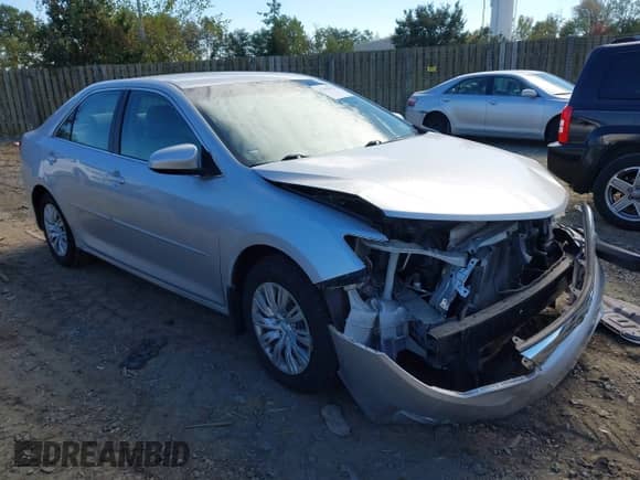 2014 Toyota Camry XLE with VIN 4T4BF1FKXER444817, listed as a IAAI auction lot 43456924 with 107,008 mi miles and . Bid and sale history available at DreamBid. Image 1.