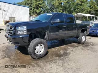 2013 Chevrolet Silverado 1500 LTZ with VIN 3GCPKTE79DG117304, listed as a Copart auction lot 71960965 with 217,481 mi miles and Salvage title. Bid and sale history available at DreamBid. Image 1.