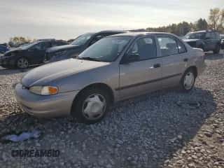 2002 Chevrolet Prizm z VIN 1Y1SK52852Z402299, wystawiony jako Copart lot #75531654 z przebiegiem 72 976 mil mil oraz Czysty tytuł • Clean title. Historia ofert i sprzedaży dostępna na DreamBid. Obrazek 1.