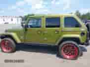 2007 Jeep Wrangler Unlimited Sahara с VIN 1J4GA59117L118162, выставлен на аукционе IAAI как лот 42835652 с пробегом 199 208 миль миль и . История ставок и продаж доступна на DreamBid. Изображение 14.