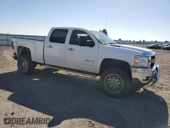 2012 Chevrolet Silverado 2500HD LT with VIN 1GC1KXCG0CF105252, listed as a Copart auction lot 82057375 with 184,760 mi miles and Salvage title. Bid and sale history available at DreamBid. Image 4.