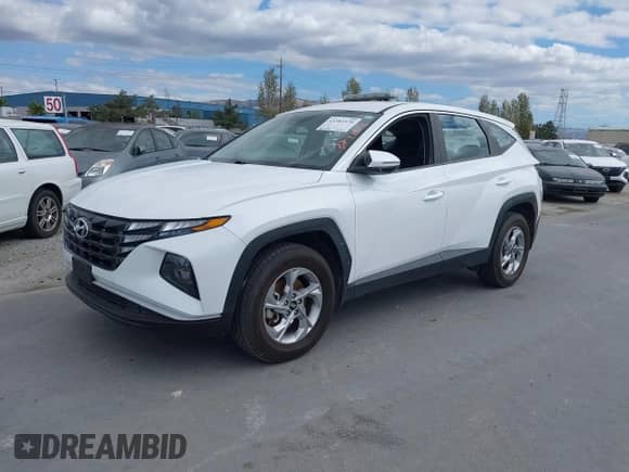 2022 Hyundai Tucson SE with VIN 5NMJACAE0NH058470, listed as a IAAI auction lot 43383370 with 89,596 mi miles and . Bid and sale history available at DreamBid. Image 2.