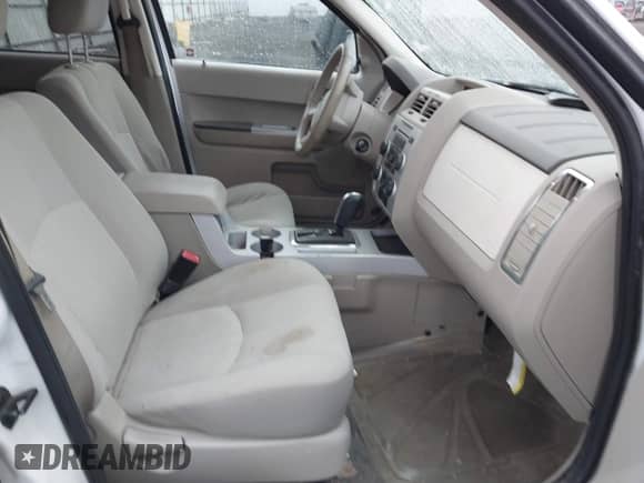 2008 Mercury Mariner with VIN 4M2CU91Z88KJ01185, listed as a IAAI auction lot 41778434 with 165,654 mi miles and . Bid and sale history available at DreamBid. Image 5.