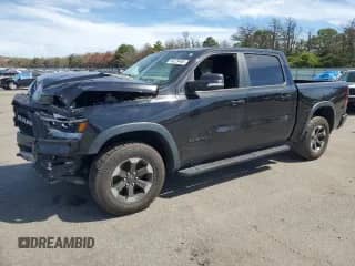 2019 Ram 1500 Rebel with VIN 1C6SRFLT0KN698856, listed as a Copart auction lot 69225485 with 143,146 mi miles and Salvage title. Bid and sale history available at DreamBid. Image 1.