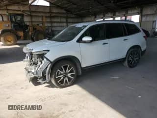 2021 Honda Pilot Touring 8-Passenger с VIN 5FNYF6H94MB047983, выставлен на аукционе Copart как лот 62934165 с пробегом 81 644 миль миль и Списание • Salvage title. История ставок и продаж доступна на DreamBid. Изображение 1.