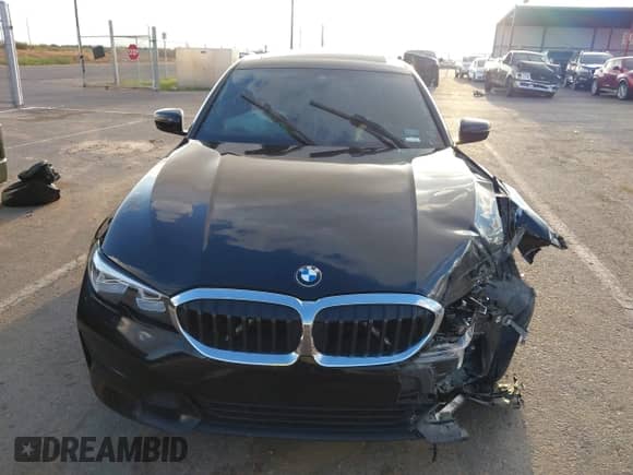 2019 BMW 3 Series 330i with VIN WBA5R1C51KFH29794, listed as a IAAI auction lot 43089716 with Not provided miles and . Bid and sale history available at DreamBid. Image 12.