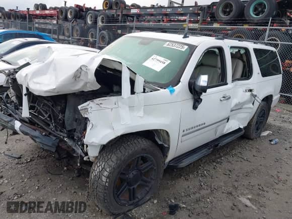 2009 Chevrolet Suburban LTZ z VIN 1GNFK36359R256609, wystawiony jako IAAI lot #42799458 z przebiegiem 146 257 mil mil oraz . Historia ofert i sprzedaży dostępna na DreamBid. Obrazek 17.