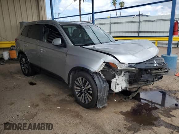 2020 Mitsubishi Outlander SE with VIN JA4AD3A34LJ000854, listed as a Copart auction lot 80376935 with 123,035 mi miles and Clean title. Bid and sale history available at DreamBid. Image 4.