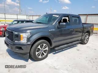 2020 Ford F-150 XL with VIN 1FTEW1CP7LFA77128, listed as a Copart auction lot 80916535 with 124,436 mi miles and Salvage title. Bid and sale history available at DreamBid. Image 1.