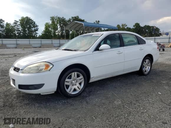 2006 Chevrolet Impala LT 3.9L with VIN 2G1WC581369259763, listed as a Copart auction lot 66530805 with 128,557 mi miles and Salvage title. Bid and sale history available at DreamBid. Image 1.