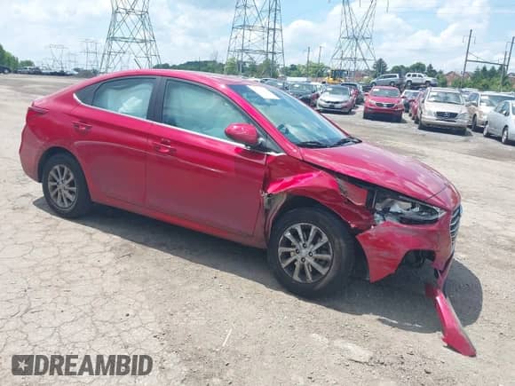 2022 Hyundai Accent SE z VIN 3KPC24A63NE173401, wystawiony jako IAAI lot #42394442 z przebiegiem 75 025 mil mil oraz . Historia ofert i sprzedaży dostępna na DreamBid. Obrazek 1.