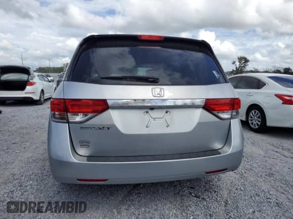 2015 Honda Odyssey LX with VIN 5FNRL5H22FB025431, listed as a Copart auction lot 82373215 with 112,487 mi miles and Salvage title. Bid and sale history available at DreamBid. Image 6.