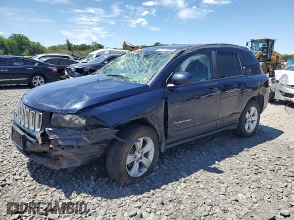 2015 Jeep Compass High Altitude with VIN 1C4NJDEB5FD324096, listed as a Copart auction lot 64557885 with 111,175 mi miles and Salvage title. Bid and sale history available at DreamBid. Image 1.