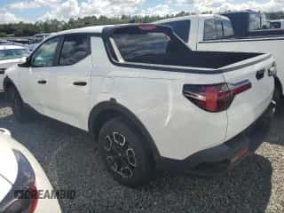 2022 Hyundai Santa Cruz SEL с VIN 5NTJBDAE6NH031751, выставлен на аукционе Copart как лот 74124684 с пробегом Не указан миль и На запчасти • Non repairable. История ставок и продаж доступна на DreamBid. Изображение 2.