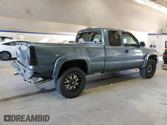 2006 GMC Sierra 1500 SLT with VIN 1GTEK19B46Z209658, listed as a Copart auction lot 54836765 with 207,851 mi miles and Salvage title. Bid and sale history available at DreamBid. Image 3.