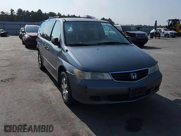 2002 Honda Odyssey LX with VIN 2HKRL18532H504584, listed as a Copart auction lot 67735975 with 230,708 mi miles and Salvage title. Bid and sale history available at DreamBid. Image 14.