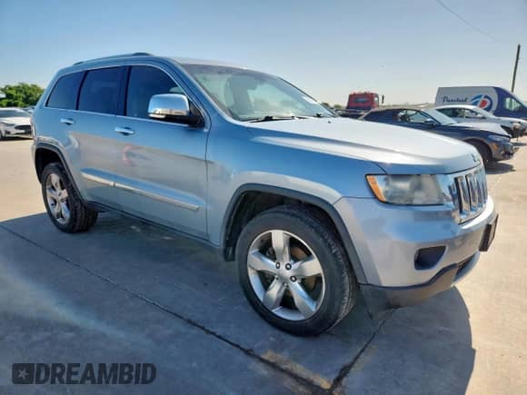 2012 Jeep Grand Cherokee Overland с VIN 1C4RJECT0CC317030, выставлен на аукционе Copart как лот 60969715 с пробегом 160 876 миль миль и Чистый • Clean title. История ставок и продаж доступна на DreamBid. Изображение 4.