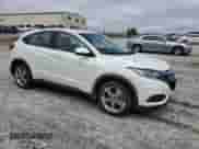 2022 Honda HR-V LX with VIN 3CZRU5H38NM721821, listed as a Copart auction lot 60409005 with 72,271 mi miles and Salvage title. Bid and sale history available at DreamBid. Image 4.