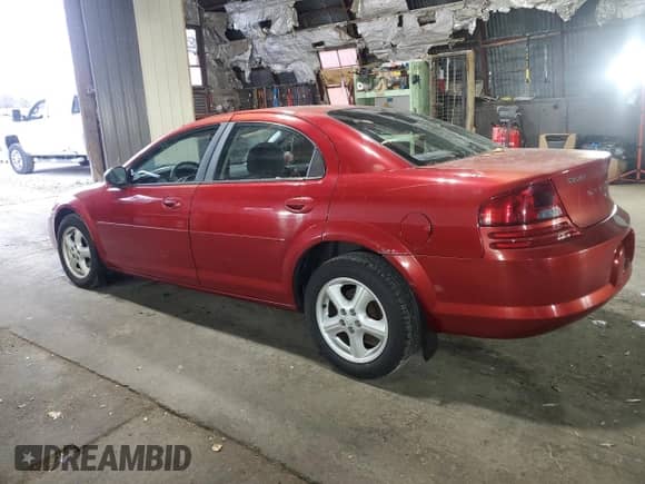 2004 Dodge Stratus SXT with VIN 1B3EL46R04N361278, listed as a Copart auction lot 79218494 with 73,075 mi miles and Salvage title. Bid and sale history available at DreamBid. Image 2.