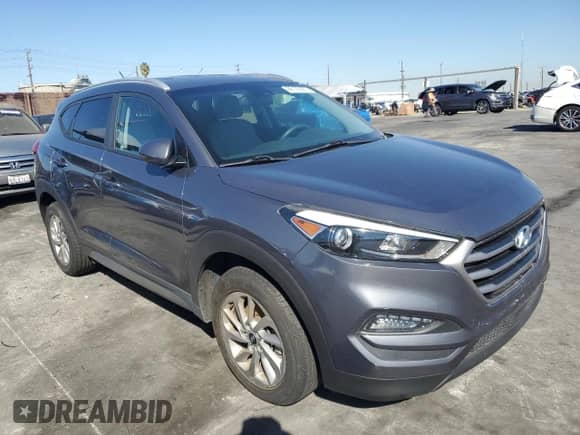 2017 Hyundai Tucson SE z VIN KM8J33A42HU313548, wystawiony jako Copart lot #86123925 z przebiegiem Nie podano mil oraz Szkoda całkowita • Salvage title. Historia ofert i sprzedaży dostępna na DreamBid. Obrazek 4.