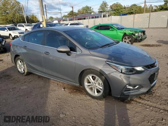 2018 Chevrolet Cruze LT with VIN 1G1BE5SM1J7153771, listed as a Copart auction lot 81949635 with 73,172 mi miles and Salvage title. Bid and sale history available at DreamBid. Image 4.