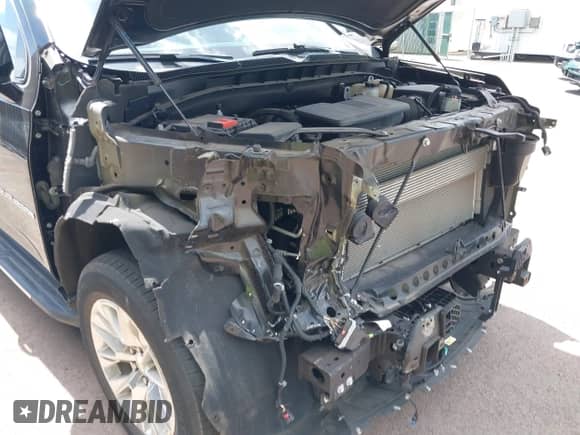 2023 Chevrolet Suburban Premier with VIN 1GNSCFKD1PR410564, listed as a IAAI auction lot 42247001 with 23,048 mi miles and . Bid and sale history available at DreamBid. Image 6.