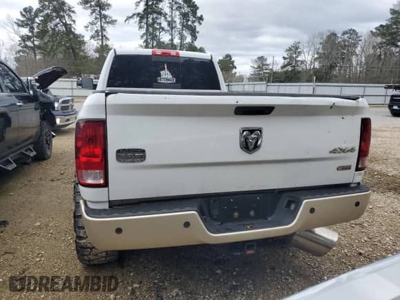 2012 Dodge RAM с VIN 3C6UD5LL4CG338615, выставлен на аукционе Copart как лот 45263175 с пробегом 232 166 миль миль и Списание • Salvage title. История ставок и продаж доступна на DreamBid. Изображение 6.