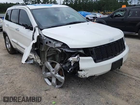 2012 Jeep Grand Cherokee Overland z VIN 1C4RJFCG8CC325367, wystawiony jako Copart lot #66274415 z przebiegiem 149 290 mil mil oraz Szkoda całkowita • Salvage title. Historia ofert i sprzedaży dostępna na DreamBid. Obrazek 14.