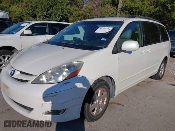 2009 Toyota Sienna XLE with VIN 5TDZK22CX9S232491, listed as a IAAI auction lot 43389674 with 298,733 mi miles and . Bid and sale history available at DreamBid. Image 6.