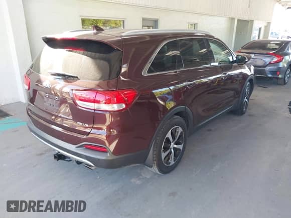 2017 Kia Sorento EX z VIN 5XYPH4A57HG293717, wystawiony jako IAAI lot #42964413 z przebiegiem 89 481 mil mil oraz . Historia ofert i sprzedaży dostępna na DreamBid. Obrazek 4.
