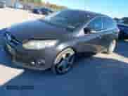 2013 Ford Focus Titanium with VIN 1FADP3N2XDL141869, listed as a IAAI auction lot 43471319 with 190,886 mi miles and . Bid and sale history available at DreamBid. Image 2.