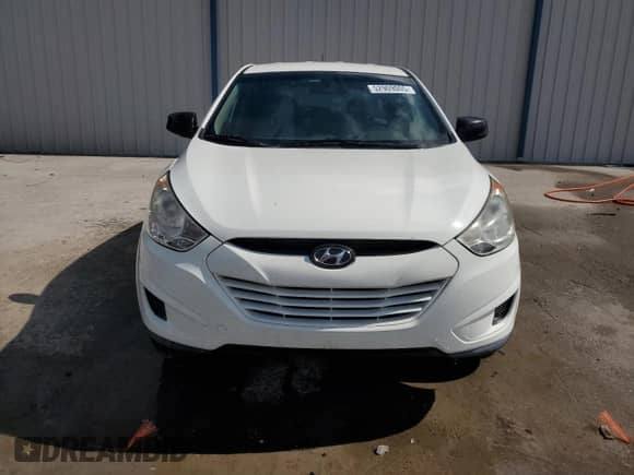 2012 Hyundai Tucson GL z VIN KM8JT3AB5CU506865, wystawiony jako Copart lot #52969005 z przebiegiem 117 109 mil mil oraz Szkoda całkowita • Salvage title. Historia ofert i sprzedaży dostępna na DreamBid. Obrazek 5.