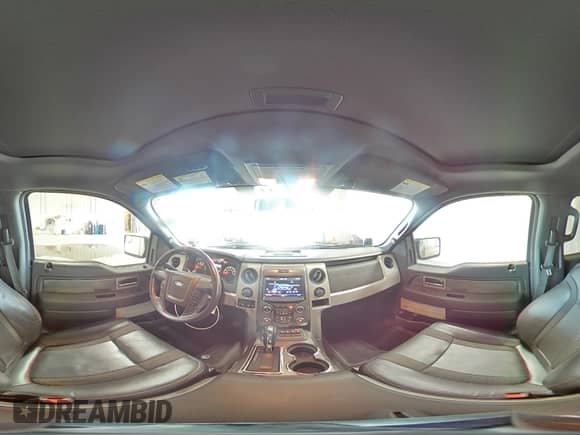 2013 Ford F-150 SVT Raptor with VIN 1FTFW1R64DFA08434, listed as a Copart auction lot 66561235 with 93,672 mi miles and Salvage title. Bid and sale history available at DreamBid. Image 14.