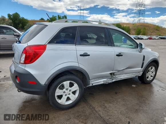 2013 Chevrolet Captiva Sport LS z VIN 3GNAL2EK4DS575807, wystawiony jako Copart lot #70582025 z przebiegiem 113 236 mil mil oraz Szkoda całkowita • Salvage title. Historia ofert i sprzedaży dostępna na DreamBid. Obrazek 3.