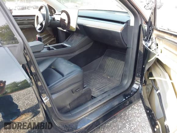 2023 Tesla Model Y Long Range with VIN 7SAYGDEE7PF825882, listed as a IAAI auction lot 42975990 with 44,109 mi miles and . Bid and sale history available at DreamBid. Image 5.