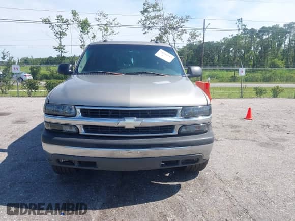 2003 Chevrolet Tahoe LT z VIN 1GNEC13Z13R236967, wystawiony jako IAAI lot #42541249 z przebiegiem 305 448 mil mil oraz . Historia ofert i sprzedaży dostępna na DreamBid. Obrazek 6.