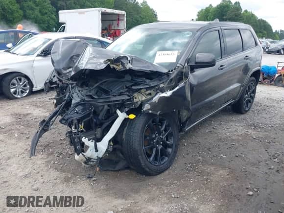 2017 Jeep Grand Cherokee Altitude with VIN 1C4RJFAG1HC866674, listed as a IAAI auction lot 42308653 with 98,123 mi miles and . Bid and sale history available at DreamBid. Image 2.
