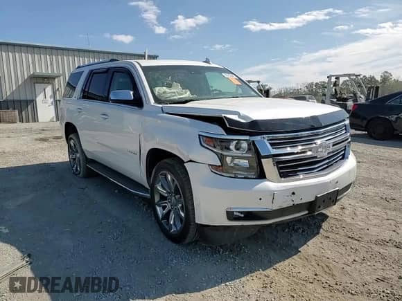 2016 Chevrolet Tahoe LTZ с VIN 1GNSKCKC2GR414275, выставлен на аукционе Copart как лот 80258485 с пробегом 173 704 миль миль и Списание • Salvage title. История ставок и продаж доступна на DreamBid. Изображение 14.