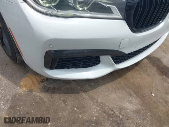 2018 BMW 7 Series 750i with VIN WBA7F0C51JGM22868, listed as a IAAI auction lot 42880516 with 137,487 mi miles and . Bid and sale history available at DreamBid. Image 6.