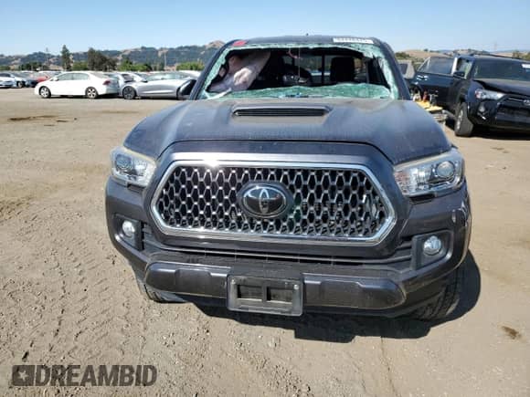 2018 Toyota Tacoma SR5 with VIN 5TFRZ5CN5JX059250, listed as a Copart auction lot 64448425 with 28,951 mi miles and Salvage title. Bid and sale history available at DreamBid. Image 5.